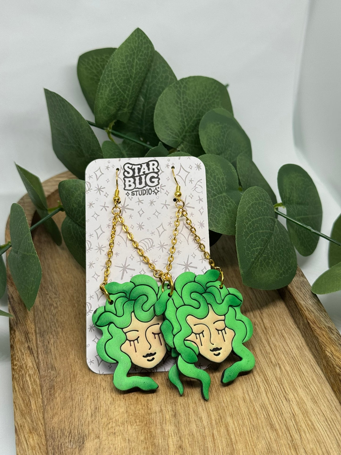 medusa dangle earrings