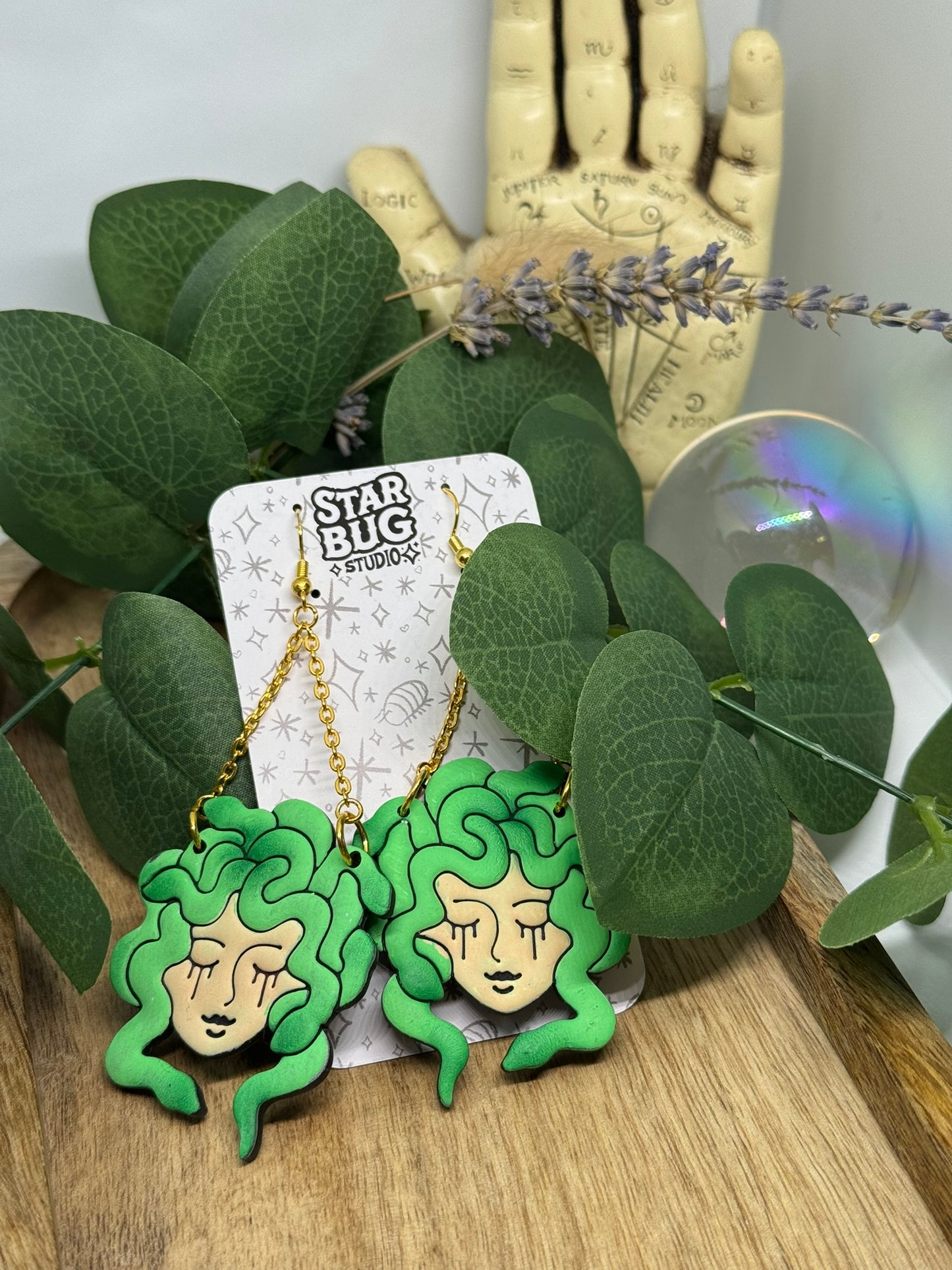 medusa dangle earrings