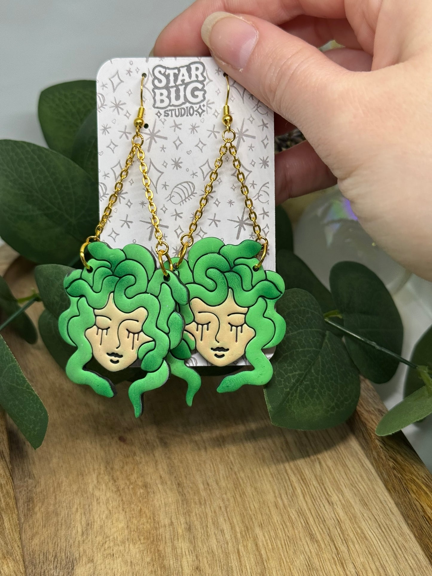 medusa dangle earrings