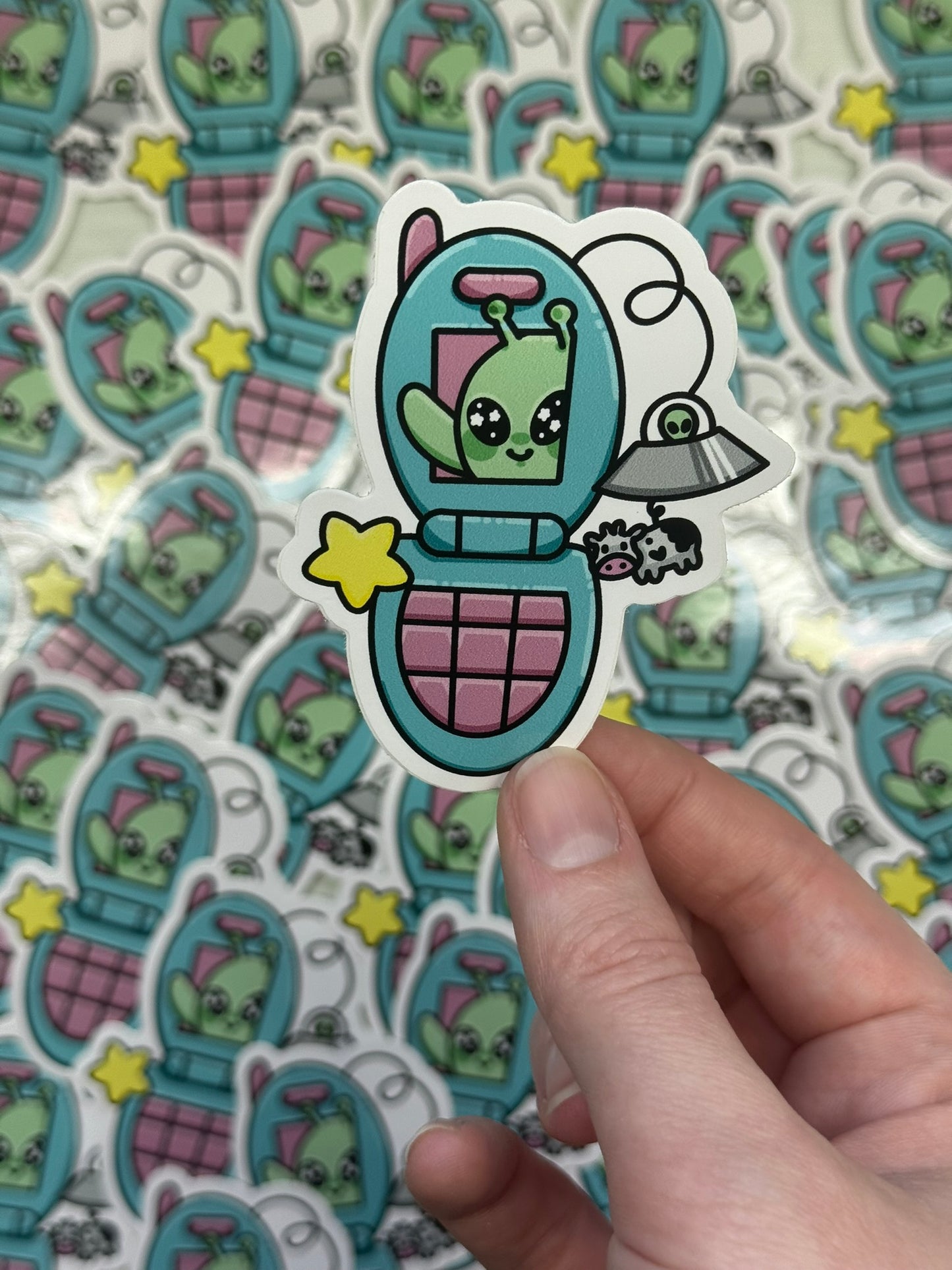 alien flip phone sticker